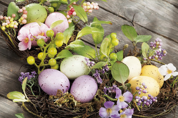 Easter eggs hidden in natural straw nest