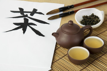 Tea ceremony set with hieroglyph 'Tea' and calligraphic brushes
