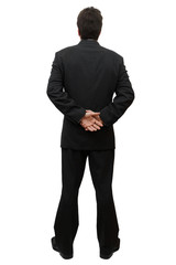 Obraz na płótnie Canvas businessman in modern elegant suit standing back isolated