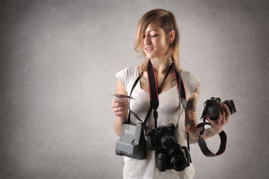 woman with cameras