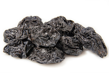 Prunes on a white background