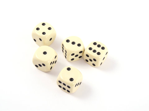 Close up photo of five dice on a white background.