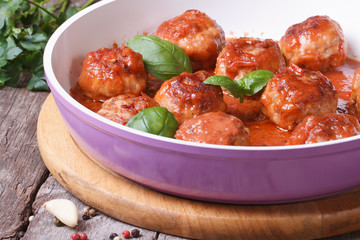 meatballs with tomato sauce in a pan