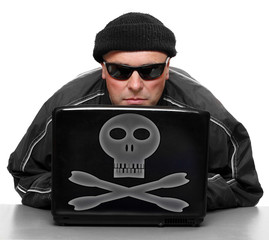 Dangerous hacker with laptop.
