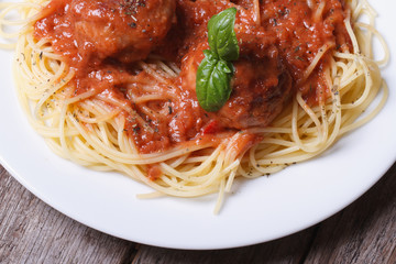 Pasta spaghetti with meatballs on a table top view