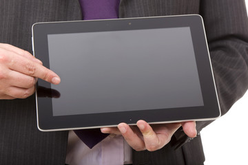 Businessman using touch pad, close up shot, isolated