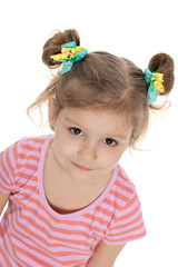 Thoughtful preschool girl against the white