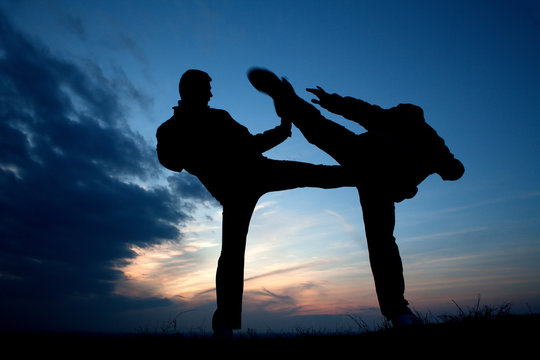 karate training in evening - silhouette