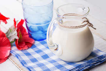 Milk on wooden table