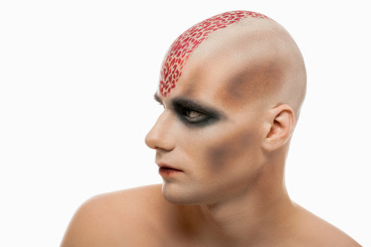 A creepy portrait with body art