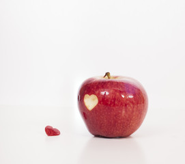 heart shape sculpted red apple