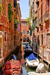 Wandaufkleber Picturesque canal in a quite neighborhood in Venice, Italy © Jenifoto
