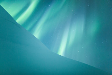 Northern lights (Aurora borealis) above snow