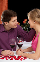 Couple having some red wine