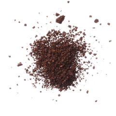 Ground coffee pile isolated on white background overhead view