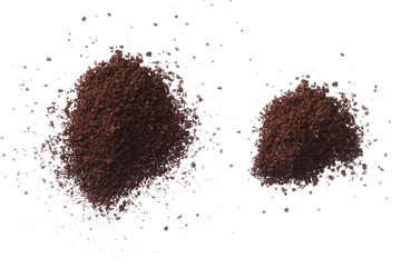 Ground coffee pile isolated on white background overhead view
