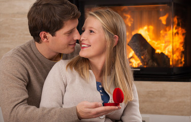 Engaged couple at home