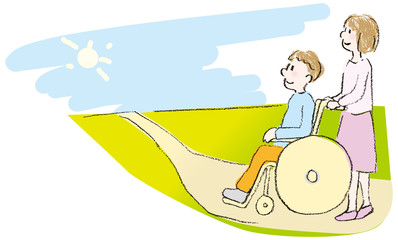 車いすの人と介助者
