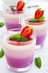 Panna cotta with strawberries and blueberries.
