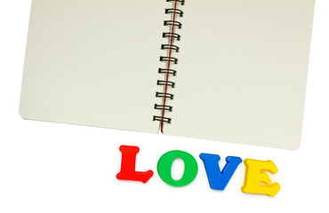 Text love and Notebook On White Background