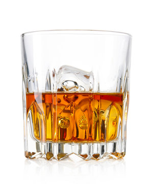 Glass Of Whiskey And Ice Isolated On White Background