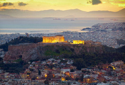 Athens, Greece. After sunset.  Parthenon and Herodium constructi