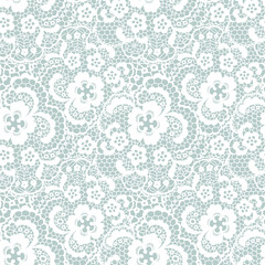 Lace seamless pattern with flowers on blue background