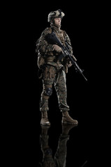 Fototapeta premium U.S. marine. American soldier. Isolated on black.