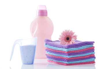 Obraz na płótnie Canvas clean cotton towels and washing detergents