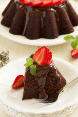 Chocolate cake with strawberries.