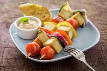Barbecued halloumi and vegetable kebabs
