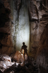 Caver in  Dachstein Mammut Cave. Austria.