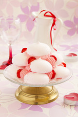 Meringue 'Pavlova' with strawberries and strawberry sauce.