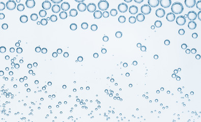 Fototapeta na wymiar Bubbles in the water. Abstract background