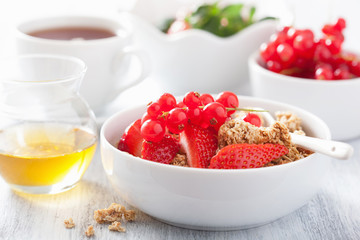 healthy breakfast with granola and strawberry