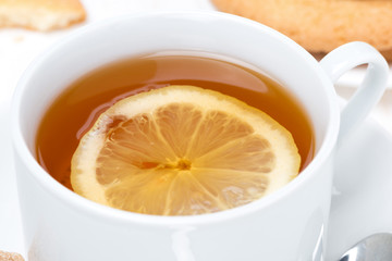 fragrant black tea with lemon, close-up