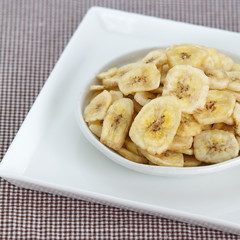 Banana chips, made from dehydrated slices of fresh ripe bananas