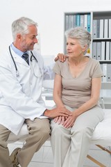 Fototapeta premium Female senior patient visiting a doctor