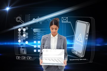 Businesswoman showing laptop with interface