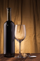 corkscrew glass  and wine bottle