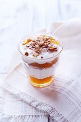 Yogurt with Peach Jam, Walnuts and Rye Flakes