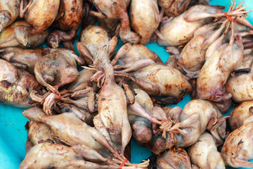 Boiled quail for sale at the market.