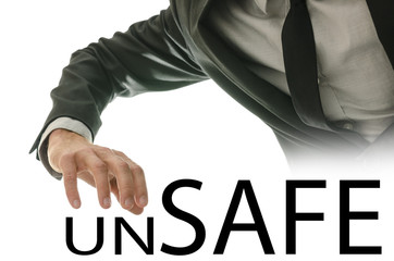Man reaching for the text Unsafe - Safe