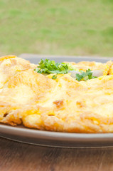 closeup of omelette, typical rolled plain omelette.