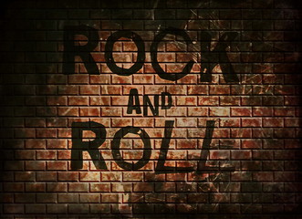 Rock and roll music word on red wall background