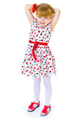 beautiful little girl with a smile jumping