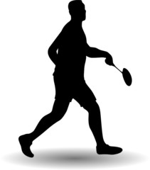 young man playing badminton