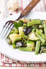 Potato salad with green beans, olives, capers, onions, delicious
