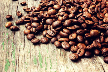 coffee beans on a grunge wooden background