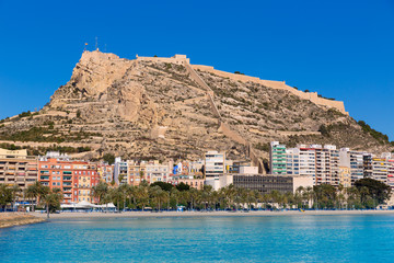 Alicante Postiguet beach and castle Santa Barbara in Spain - obrazy, fototapety, plakaty